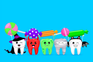 illustration of teeth dressed in Halloween costumes 