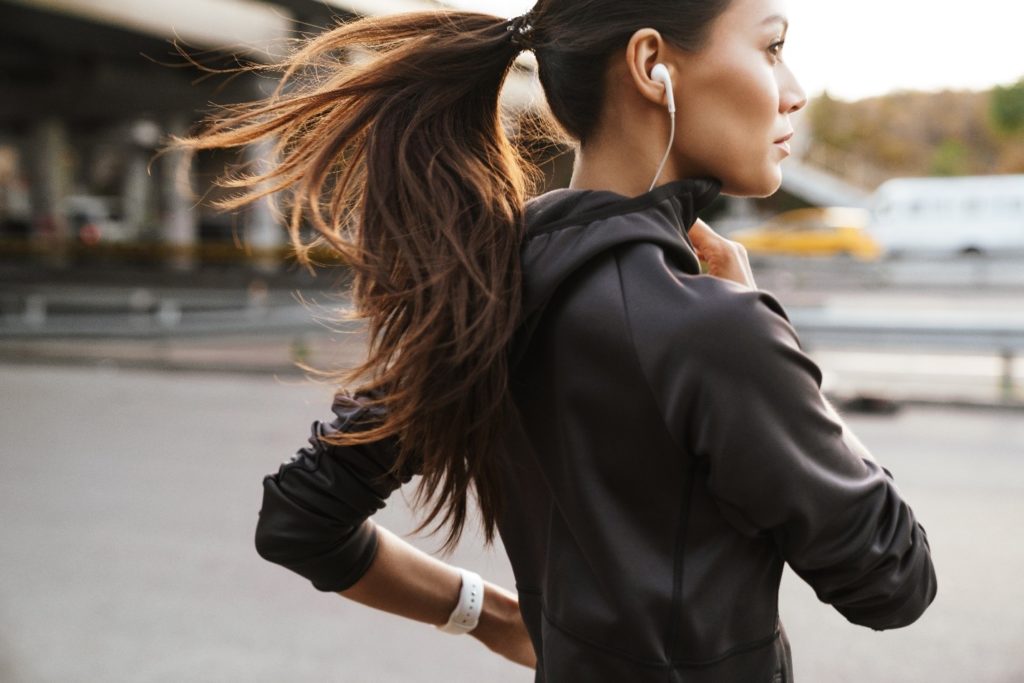 Woman exercising outside.